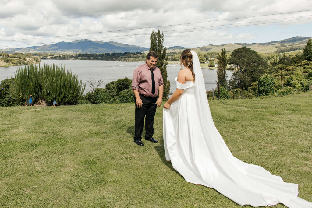 father - daughter first look at the wedding