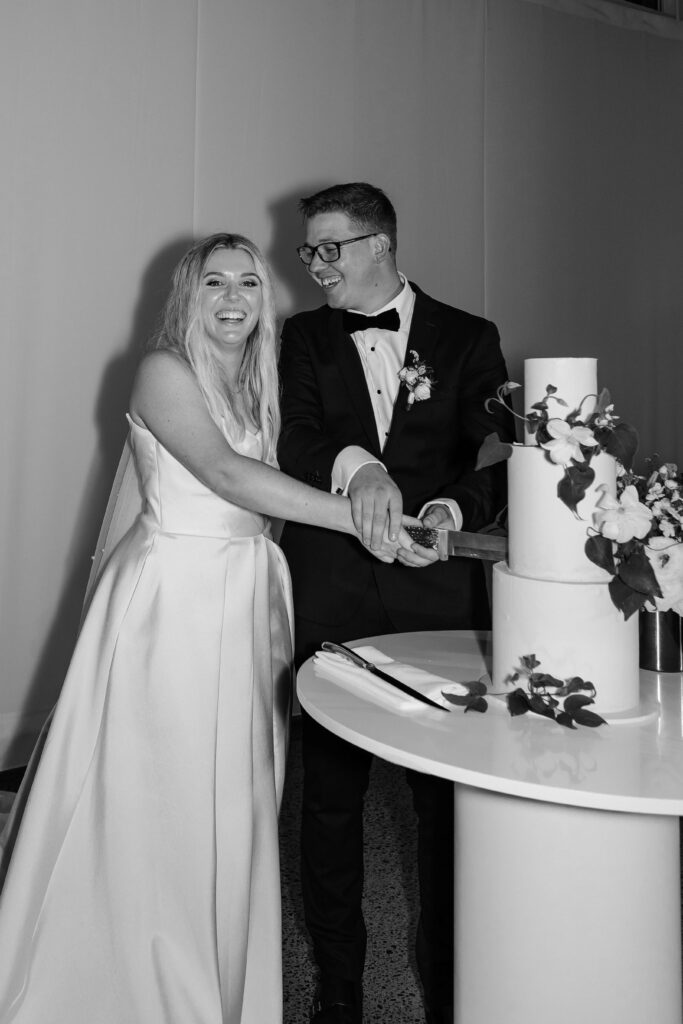 Cake cutting moment at Puketutu Island Estate historic homestead