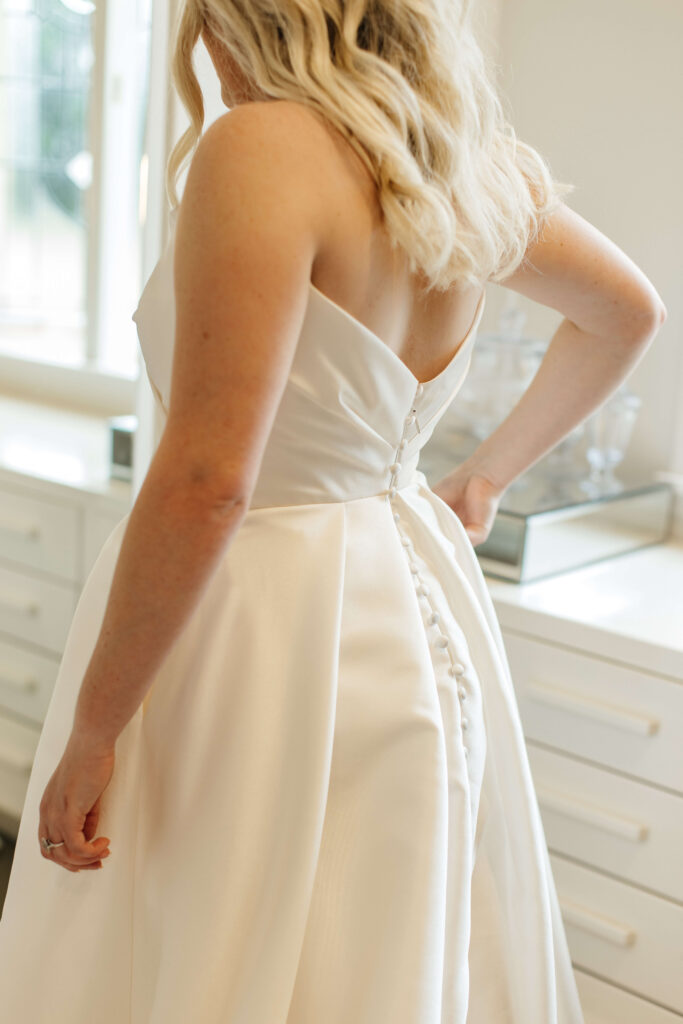 Elegant bridal portrait inside Puketutu Island Estate Spanish Mansion room