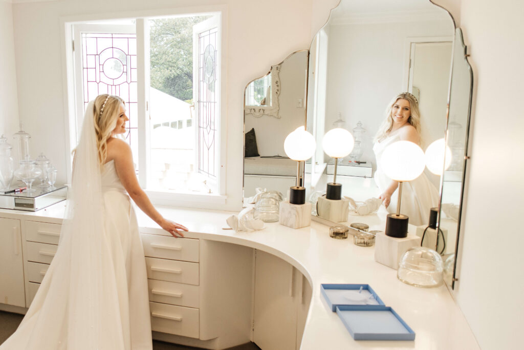 Elegant bridal portrait inside Puketutu Island Estate Spanish Mansion room