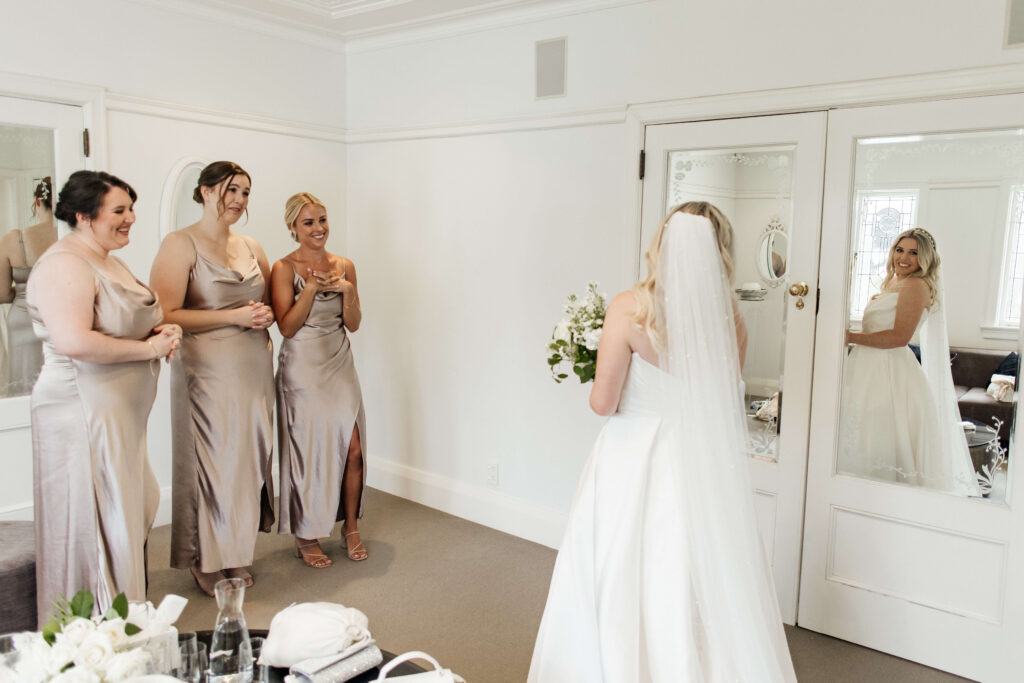 Elegant bridal portrait inside Puketutu Island Estate Spanish Mansion room