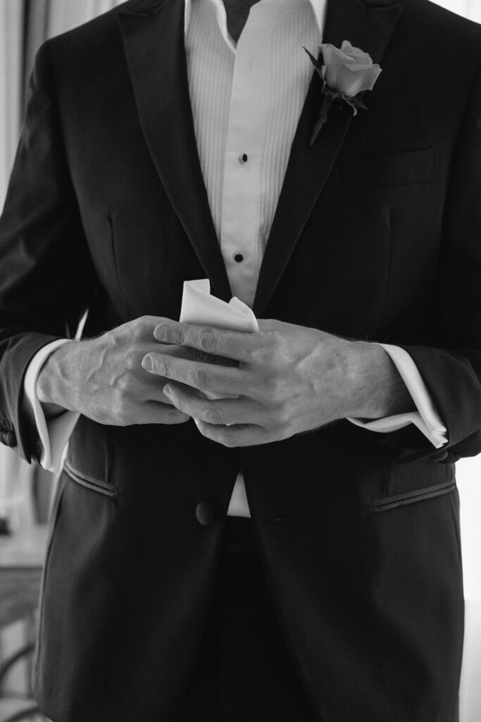 Black and white photo of the groom's suit