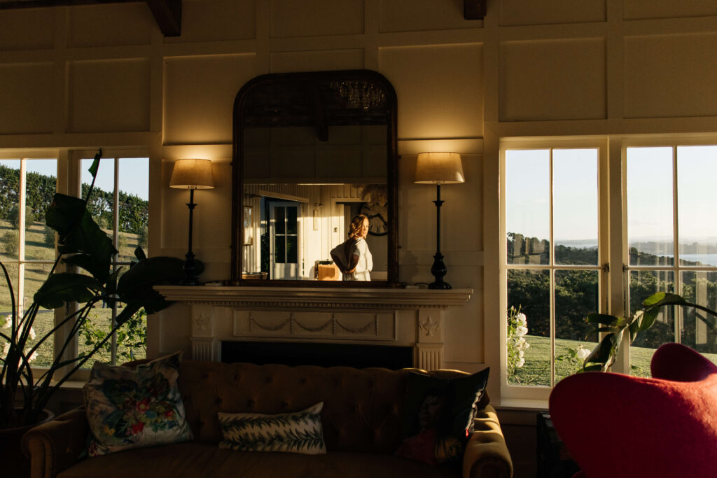 Intimate couple portraits inside Mudbrick Lodge with warm golden light – wedding at Mudbrick photographer