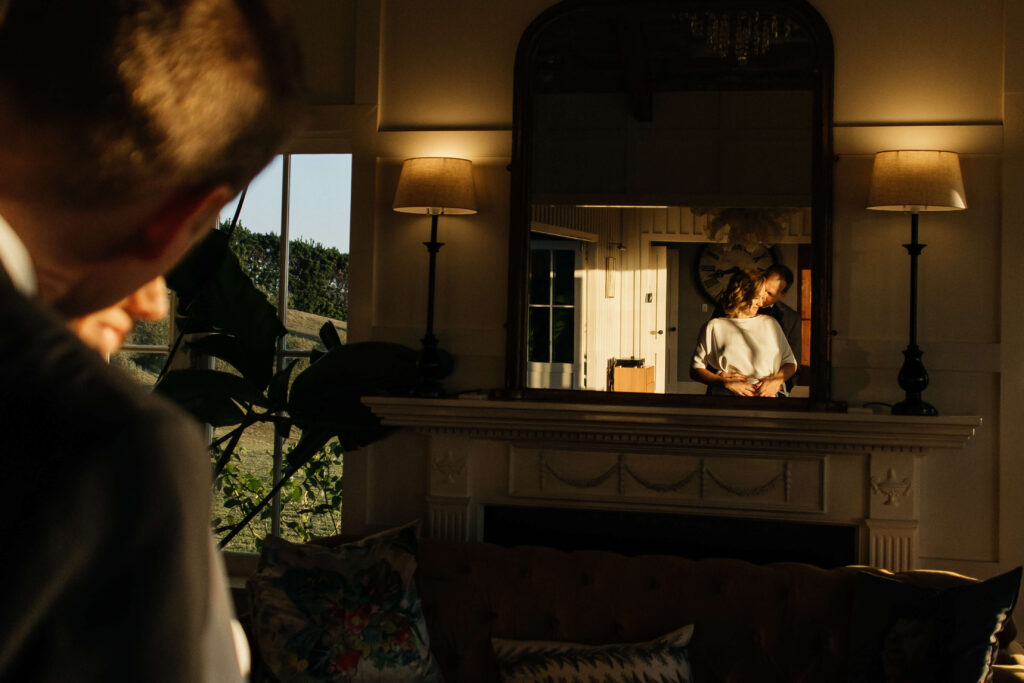 Intimate couple portraits inside Mudbrick Lodge with warm golden light – wedding at Mudbrick photographer