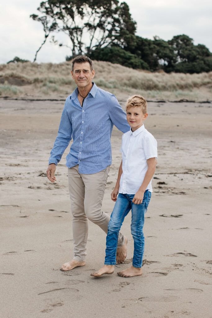 Father and son during a family photo session in Pauanui