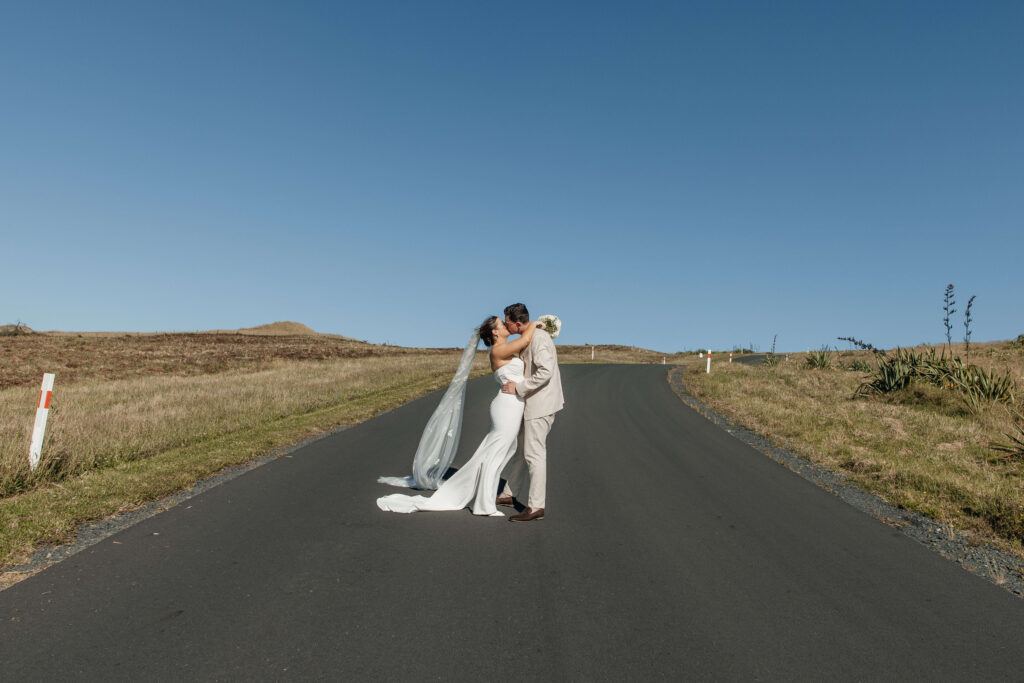 Bride and groom during their wedding at Castaways Resort in Waiuku