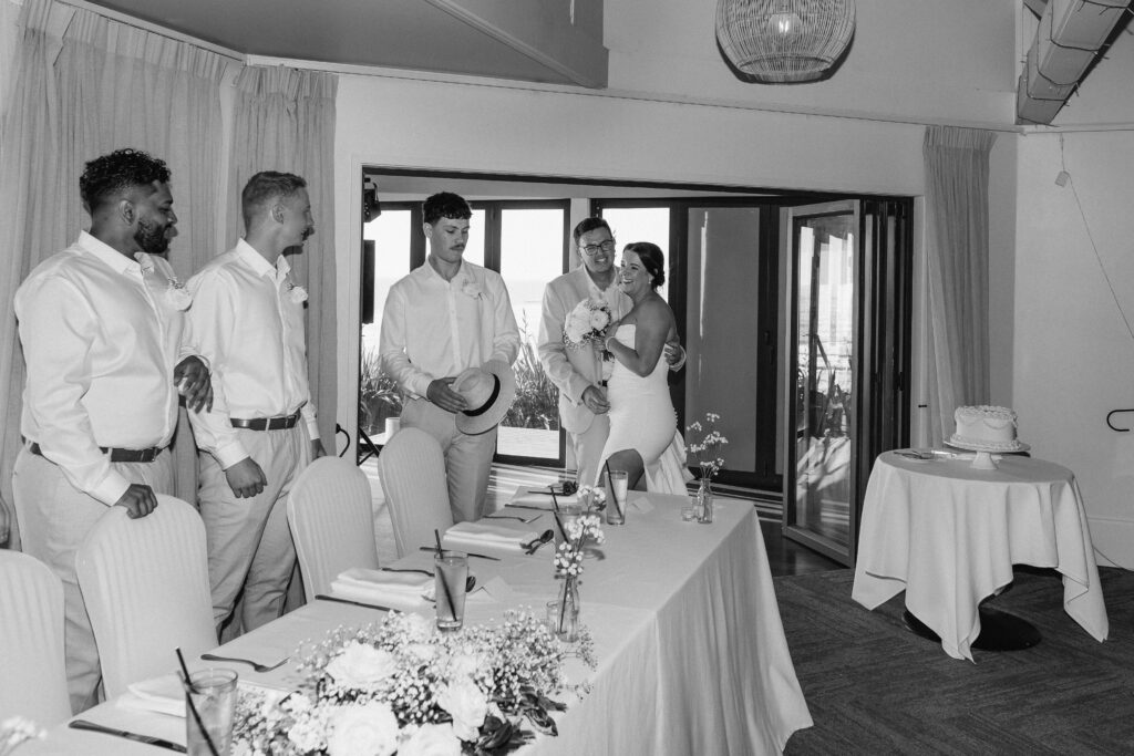 walking in as a husband and wife during reception at Castaways