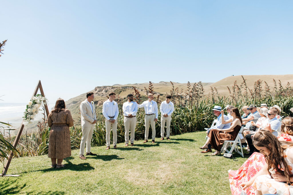 groom and groomsmen during the ceremony at Castaways