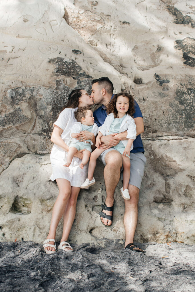 Close-up portrait of family of four enjoying their holiday photo shoot in New Zealand