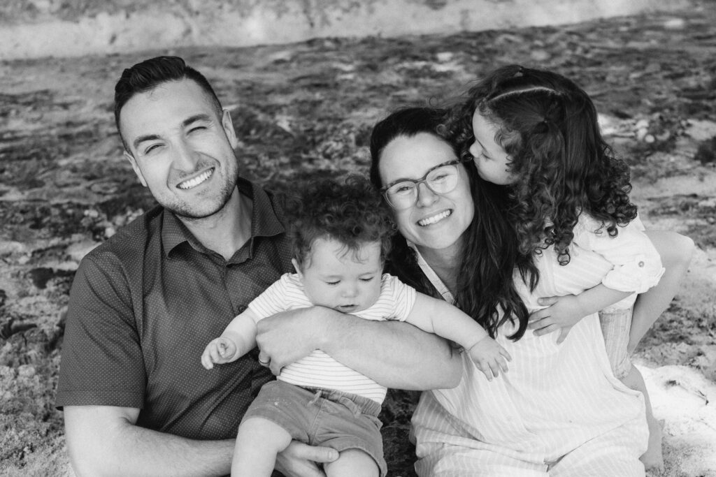 Close-up portrait of family of four enjoying their holiday photo shoot in New Zealand