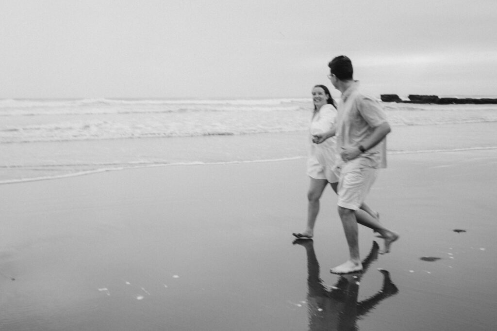 Engagement photos on the beach on a rainy day