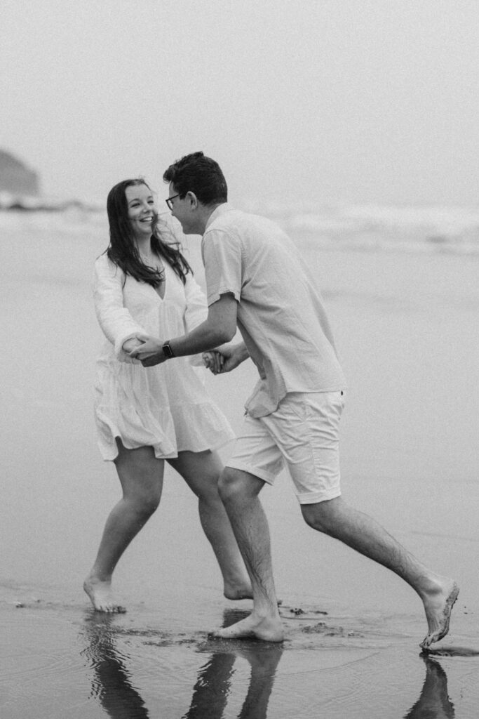 Engagement photos on the beach on a rainy day