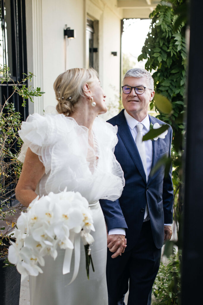 Bride and groom sharing a quiet moment together outside PAX Venue in Auckland.