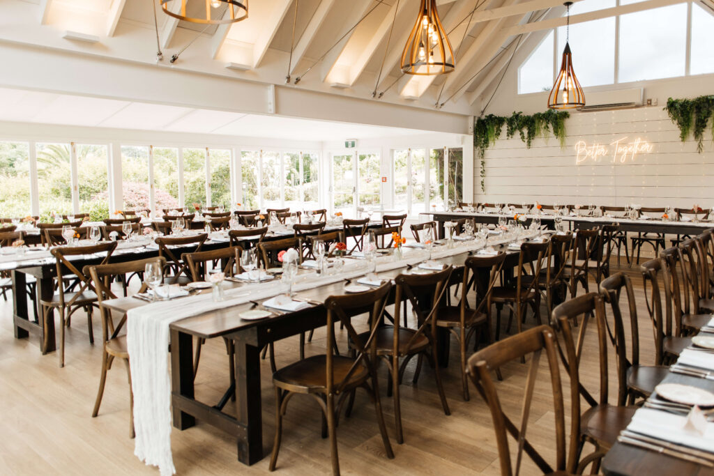 Elegant reception dinner setup inside Abel Estate for Shay and Howerd’s Auckland wedding.