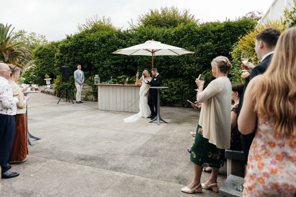 Wedding speeches at Abel Estate courtyard