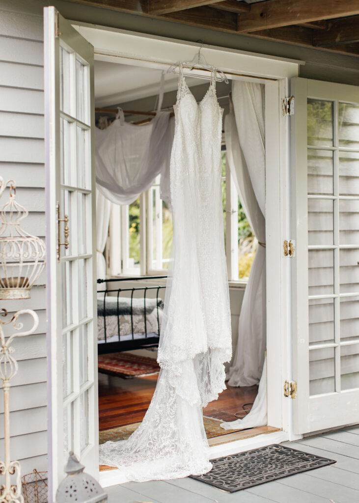 Bride getting ready at Honeysuckle Cottage in Auckland