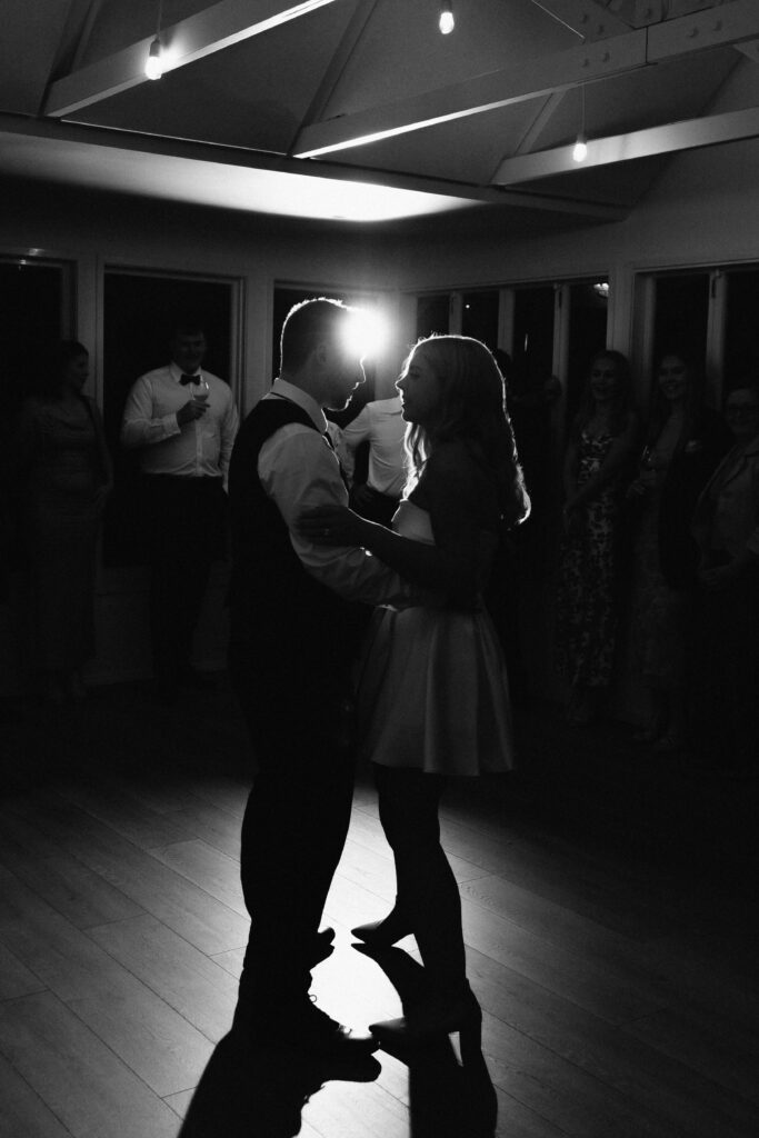 Bride and groom sharing their first dance at Abel Estate wedding reception in Kumeū.
