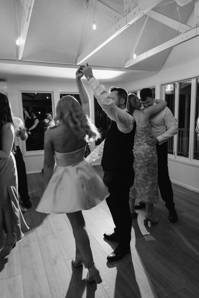 Bride and groom sharing their first dance at Abel Estate wedding reception in Kumeū.