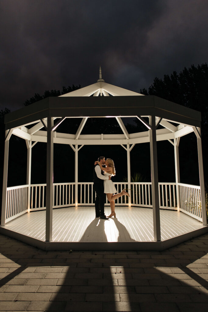 Creative wedding night portraits of Shay and Howerd under the lights at Abel Estate in Auckland.