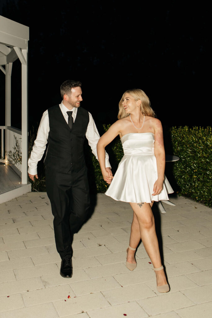 Creative wedding night portraits of Shay and Howerd under the lights at Abel Estate in Auckland.