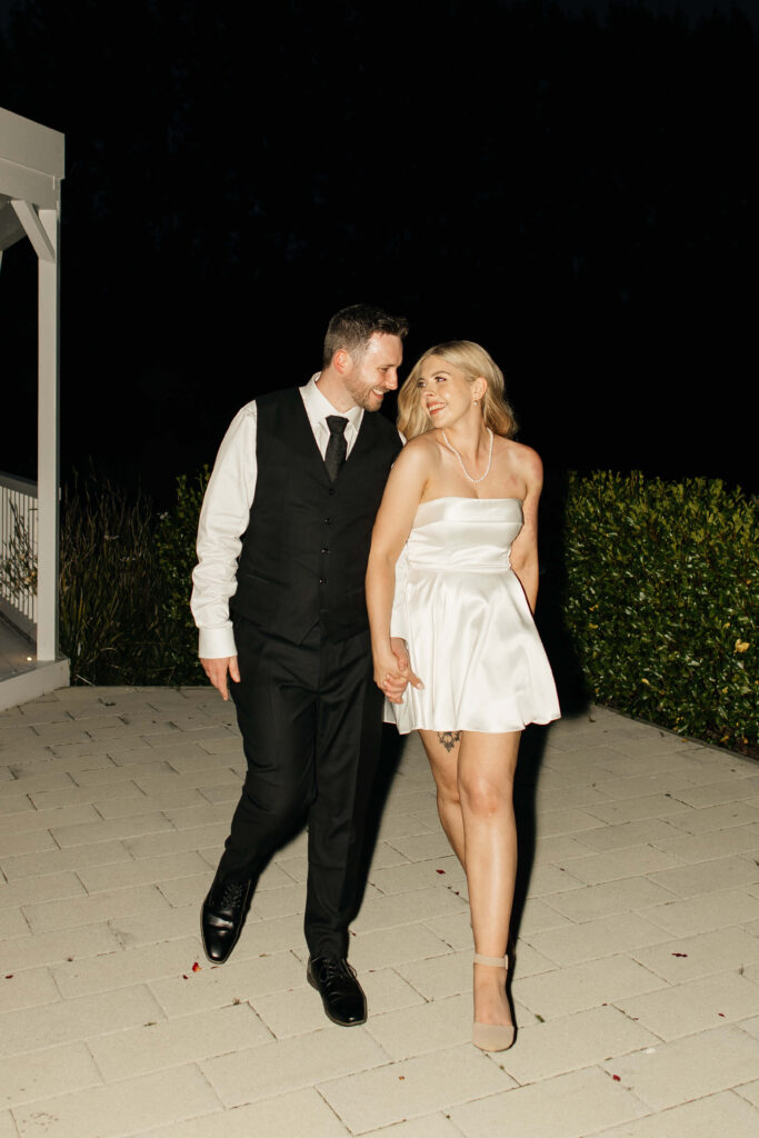 Creative wedding night portraits of Shay and Howerd under the lights at Abel Estate in Auckland.