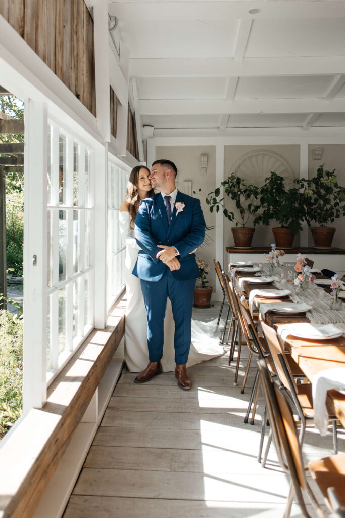 Romantic couple portraits at Old Forest School wedding venue gardens.