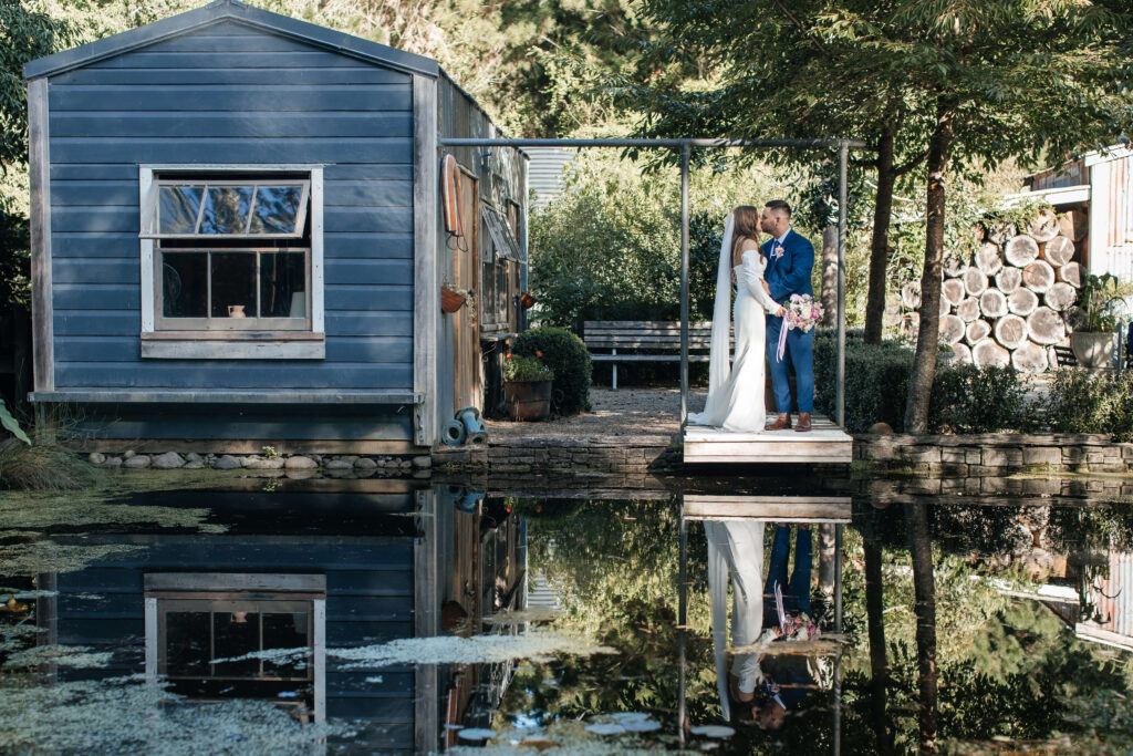 Romantic couple portraits at Old Forest School wedding venue gardens.