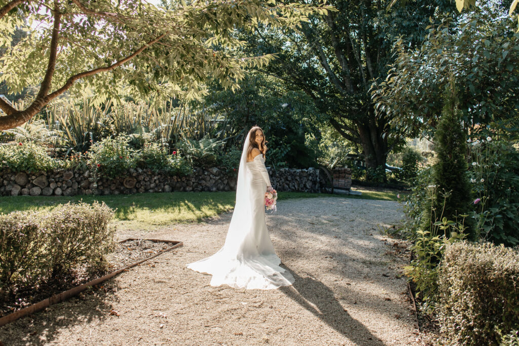 Romantic couple portraits at Old Forest School wedding venue gardens.