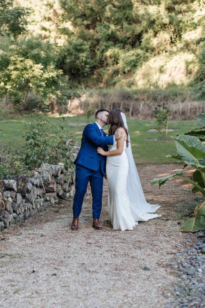 Romantic couple portraits at Old Forest School wedding venue gardens.