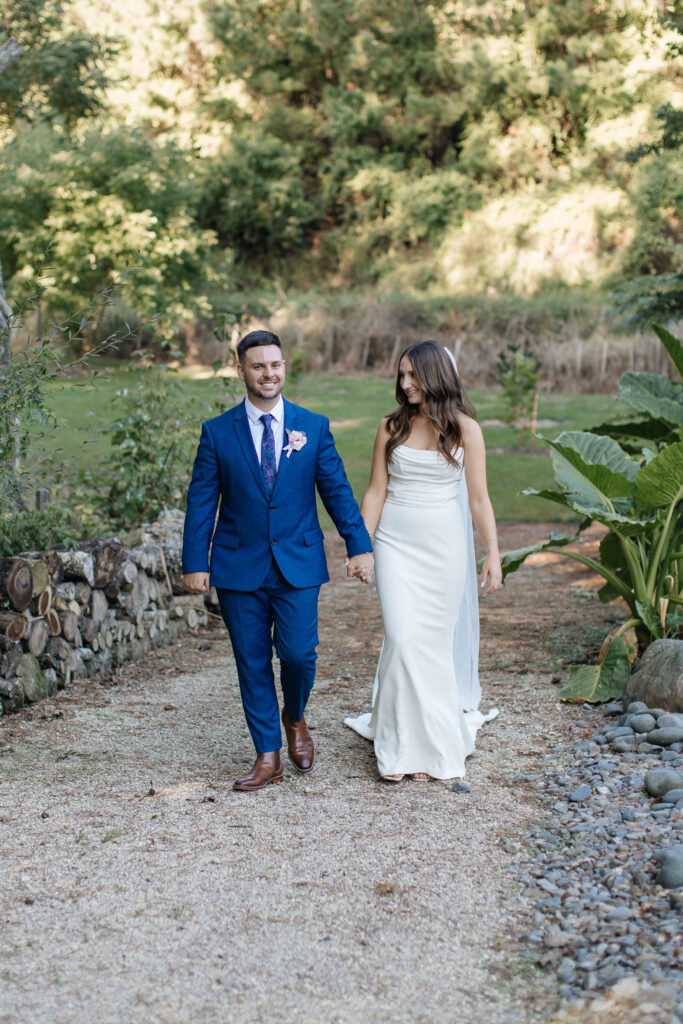 Romantic couple portraits at Old Forest School wedding venue gardens.