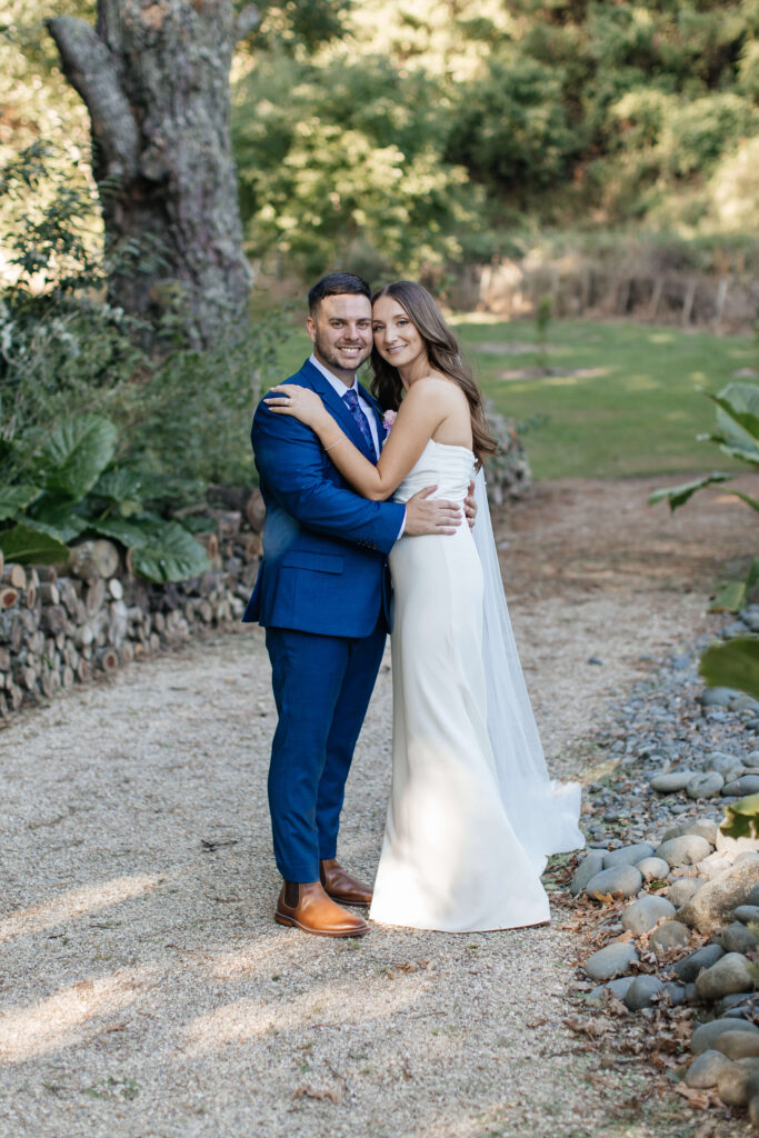 Romantic couple portraits at Old Forest School wedding venue gardens.
