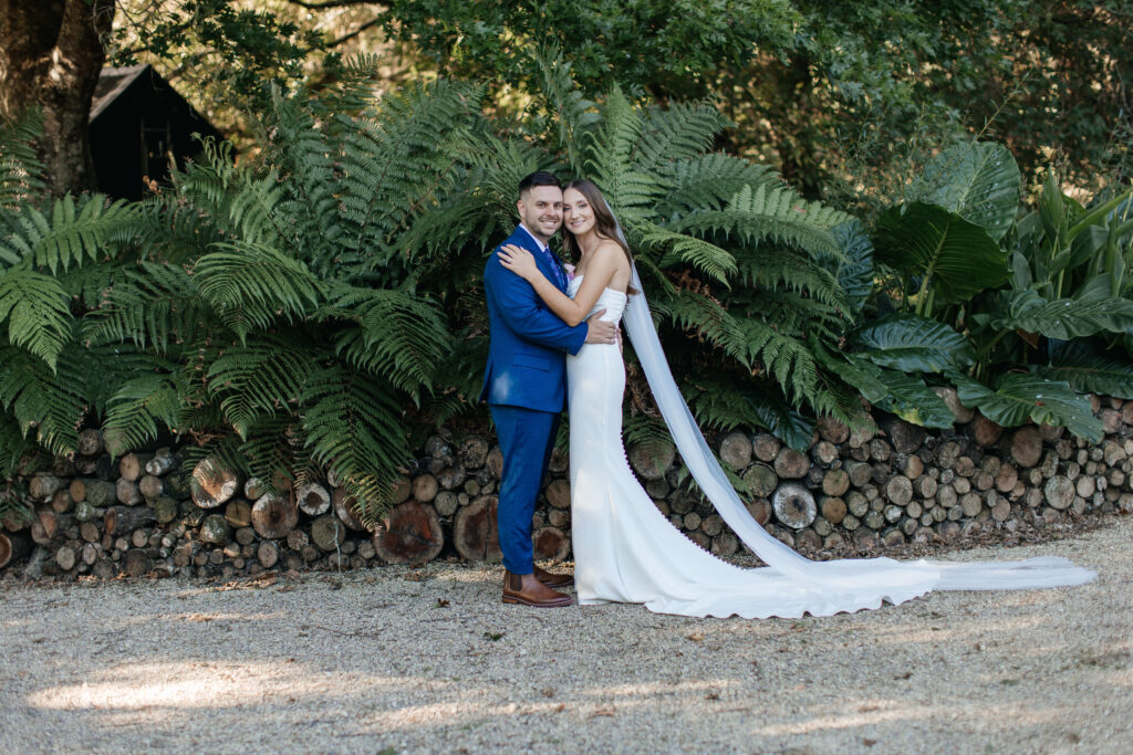 Romantic couple portraits at Old Forest School wedding venue gardens.