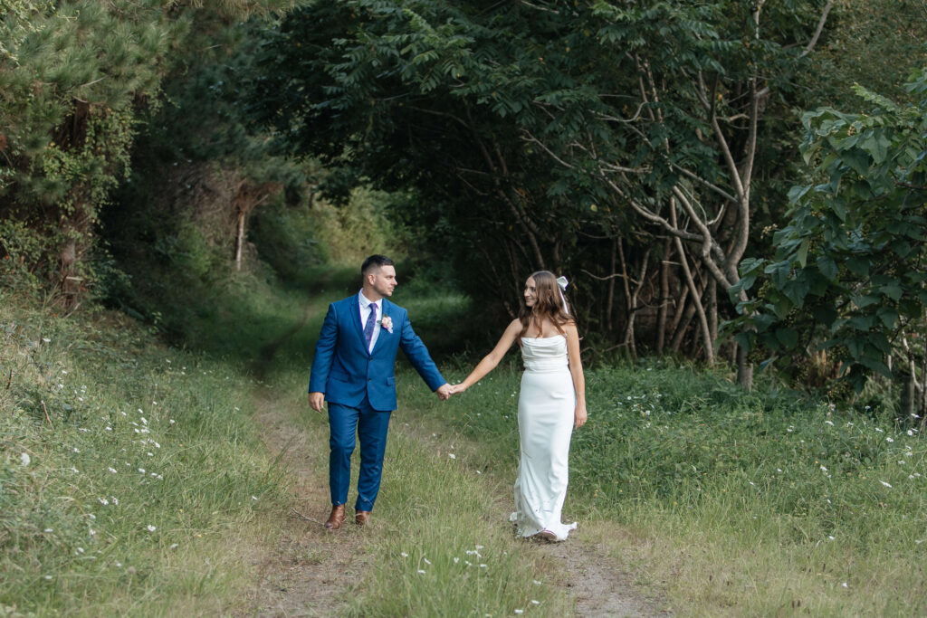 Romantic couple portraits at Old Forest School wedding venue gardens.