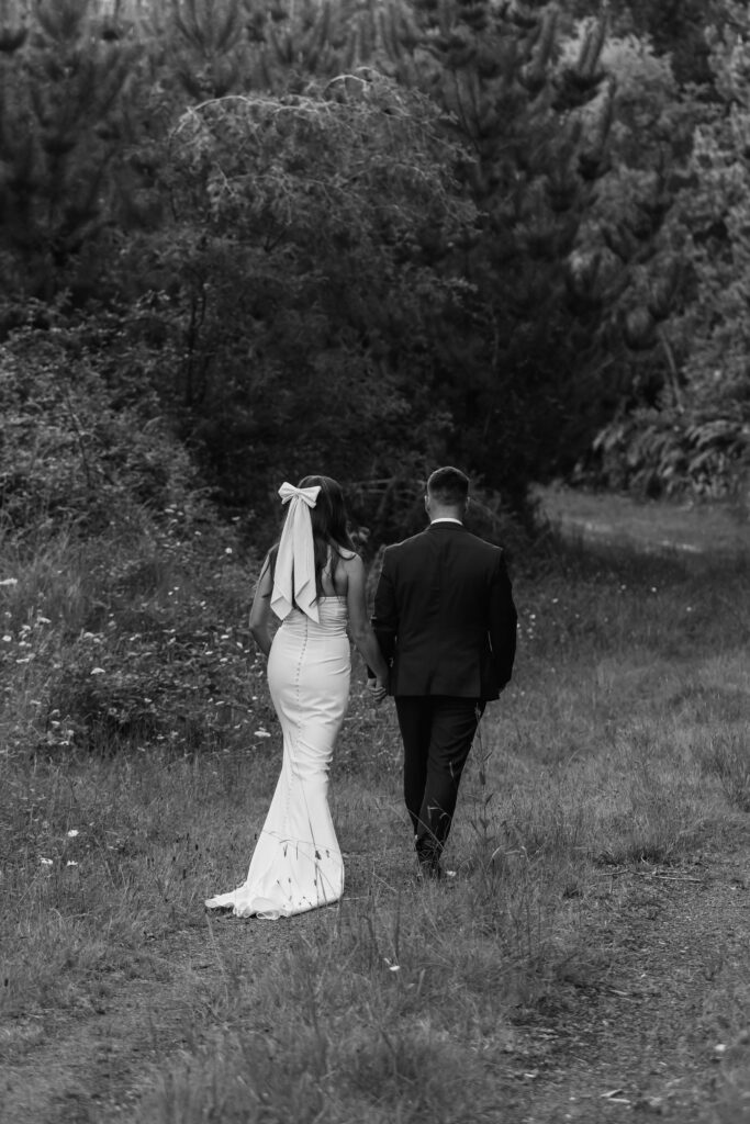 Romantic couple portraits at Old Forest School wedding venue gardens.