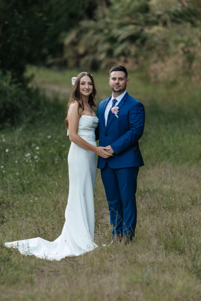 Romantic couple portraits at Old Forest School wedding venue gardens.