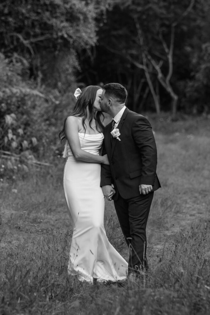 Romantic couple portraits at Old Forest School wedding venue gardens.